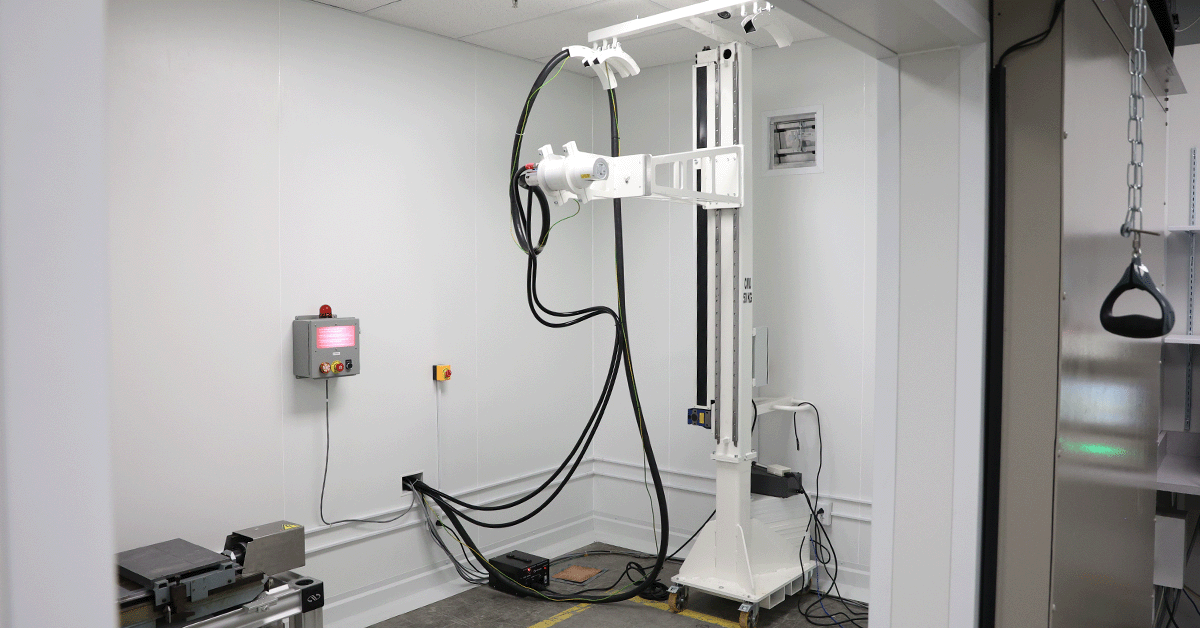 Radiographic testing machine used inside of a radiation shielded vault